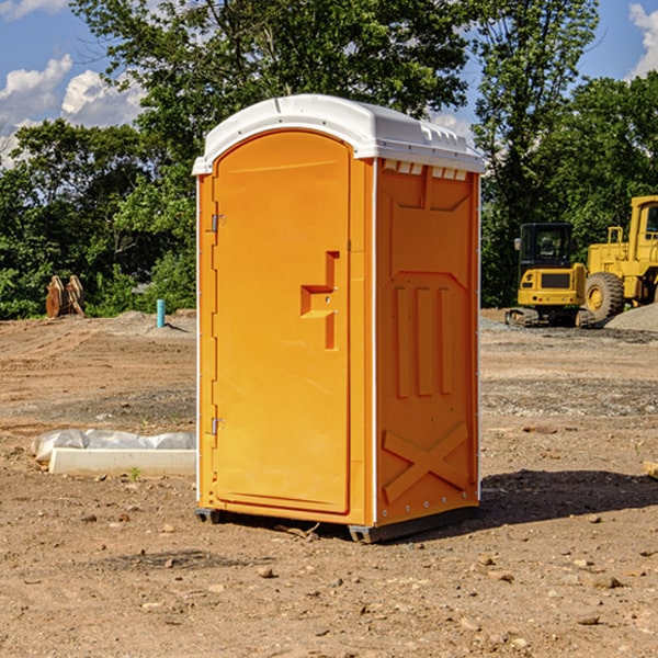 how often are the portable restrooms cleaned and serviced during a rental period in Woodland Washington